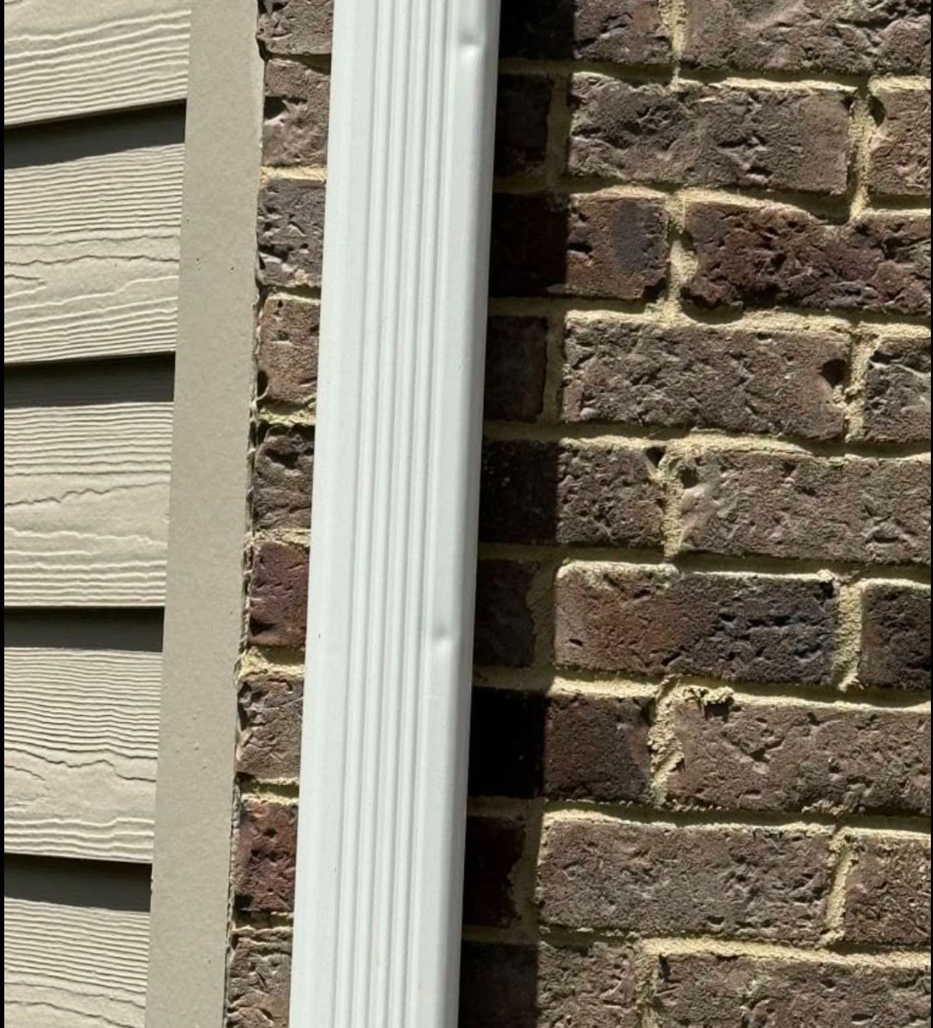 Professional gutter downspout installation in Roswell, GA — Supreme Roofing and Reconstruction